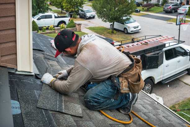 Professional Roofing technician working in South Bend, WA